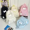Mochila fresca y sencilla de lunares con lazo para mujer, nuevo modelo 2026, mochila versátil de gran capacidad para estudiantes de secundaria y preparatoria