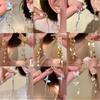 Aretes de borla de circonio de garra de alta calidad con aguja de plata 925 para mujer, temperamento de nicho de lujo ligero, aretes largos, aretes adelgazantes para rostro redondo