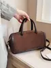 Nuevos dijes para bolso Otoño/Invierno 2026 Forma horizontal simple Bolso versátil de alta gama para mujer Bolso de mano vintage