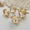 Juego de cuatro anillos vintage de estrella de mar y concha en oro mate y plata, anillos abiertos ajustables versátiles para vacaciones junto al mar, en stock