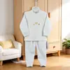 Nuevo Conjunto de Ropa Interior Térmica para Niños de Otoño e Invierno con Botones en el Hombro, Algodón Sin Costuras Dibujos Animados Capa Base para Bebé Ropa de Casa