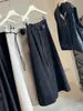 Falda Larga de Lana de Alta Gama Francesa para Mujer Estilo Nuevo Otoño/Invierno 2026 Cintura Alta Holgada Línea A Caída Longitud Media