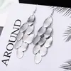 ¡Guau!Moda Transfronteriza Europea y Americana, Varios Pendientes Largos Metálicos de Borla Exagerada de Estilo Moderno con Elementos Elegantes