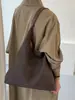 Bolso de hombro elegante y versátil, perfecto para el día a día, con un diseño nuevo, gran capacidad y un hermoso patrón tejido. Este bolso tote de moda es ideal para el otoño de 2026