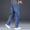 Jeans para hombre de alta gama Hong Kong, lavado azul, corte recto holgado, pantalones largos otoño 2026, pantalones elásticos para hombres de mediana edad