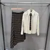 Conjunto de duas peças moda outono e inverno 2026 transfronteiriço terno xadrez retrô saia midi modeladora e camisa elegante com gravata