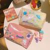 Linda celebridad de internet japonesa ins bolsa de cosméticos de gran capacidad con arena movediza de planeta corazón de niña portátil tamaño pequeño bolsa de aseo de viaje