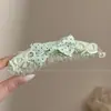 Acessórios de cabelo elegantes e sofisticados: grampos de cabelo para dar volume, presilhas de garra, presilhas verticais, presilhas de laço, presilhas banana, presilhas torcidas doces e estilosas