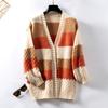 Suéter tipo cárdigan de estilo europeo y americano con rayas de colores llovizna para mujer, otoño e invierno, nuevo, informal, holgado, con mangas acampanadas y borde cruzado.
