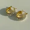Pendientes transfronterizos europeos y americanos INS chapados en oro de 18k con incrustaciones de circonita de acero inoxidable, pendientes vintage de alta gama de acero de titanio al por mayor