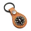 Joyería de Moda Transfronteriza Más Vendida: Llavero Sencillo de Aleación con Múltiples Calaveras y Adornos de Cuero Cosidos a Mano