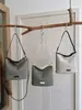 Bolsa de palha casual e descontraída estilo coreano, tecido fly-knit, grande capacidade, novo modelo 2026, adequada para férias na praia e para o dia a dia