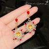 Pendientes largos con diseño de girasol, diseño antiguo de dios del sol, con microincrustaciones de diamantes amarillos y diamantes estilo retro francés.