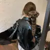 Goma para el pelo Scrunchie de Tela con Estampado de Leopardo Dulce y Fresco Coreana para Mujer 2025 Nuevo Elegante Estilo Francés Colita de Caballo Accesorio para el Cabello para Mujer