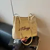 Bolso Cubo Versátil de Nicho de Moda Verano 2026 Transfronterizo para Mujer, Bolso Pequeño para el Viaje Diario, Bolso de Hombro