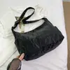 Bolsa Grande Capacidade Feminina 2024 Nova Cor Sólida Têxtil Nicho Verão Versátil Bolsa de Ombro Transversal Feminina Bolsa de Dumpling