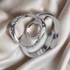 Anillo Retro de Diseño de Nicho para Mujer Acero Inoxidable Estilo Exagerado Forma Especial Hueco Apertura Ajustable Nuevo Anillo de Acero de Titanio