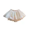 Falda para chicas sexys, anti-exposición, minifalda abullonada, estampado floral blanco, falda de línea A de cintura alta para mujeres petites, estilo de verano