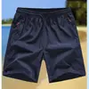 Pantalones Cortos Deportivos de Verano Finos para Hombre, Pantalones de Cinco Puntos Elásticos de Seda Helada de Secado Rápido, Pantalones Cortos Casuales Sueltos para Playa con Bolsillos con Cremallera