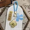 Llavero de oro puro 999, trébol de cuatro hojas dorado, cadena para teléfono móvil, colgante para bolso, regalo promocional cultural y creativo, hecho a medida