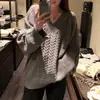 Suéter de punto de lana pura, corte ancho y holgado estilo coreano para mujer, que ofrece un look relajado y elegante, cubriendo las caderas y creando un efecto adelgazante.; un suéter grueso y cálido