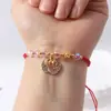 Pulsera de Cuerda Roja con Amuletos de Trébol, Mariposa y Cristales, Pulsera Tejida Ajustable para Parejas y Estudiantes, Joyería de Año de Nacimiento