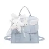 Mochila nueva, elegante y moderna, de estilo universitario nicho con diseño de estrellas, versátil como bolso de mano, bolso de hombro o cruzado de moda