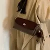 Otoño 2026 Bolso de Axila Lujo Ligero Moda Nuevo Estilo para Mujer de un Solo Hombro Cruzado Versátil Sensación de Nicho Retro de Mano Diagonal