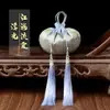 Bolsita Dorada Estilo Palacio Liuxia Jianghai con Borlas, Bolsita Bordada Estilo Chino con Patrón de Olas Marinas y Acantilados, Accesorio Hanfu