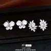 Pinza para oreja de mariposa redonda de circón, gota de agua, flor, sensación de lujo ligero y alta gama, pinza para cartílago de oreja sin perforación, accesorio de oreja elegante y versátil para mujer