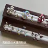 Acessórios de Nail Art da Moda Flor de Cinco Pétalas Pacote de Material com Strass Gota d'Água Formas Misturadas Strass Decorações para Unhas Conjunto de 20 Peças