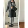 Item quente do Xiaohongshu~ Saia midi plissada estilo preppy outono/inverno em mistura de lã cinza escuro para mulheres, cintura alta, saia evasê que afina