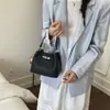Bolso de cubo de mano simple y versátil para mujer, nuevo bolso de hombro de alta gama de moda 2026, bolso cruzado de gran capacidad para el día a día