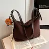 Bolso de Gamuza Marrón para Mujer Gran Capacidad 2026 Nuevo Otoño Invierno Retro para el Trabajo y el Viaje Bolso de Hombro Único Bolso Tote Versátil