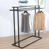 Prateleira de display ilha minimalista para loja de roupas, estante de chão para roupas masculinas, femininas e infantis, prateleira central de duas fileiras com cabideiro lateral de barra dupla