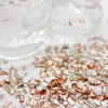 Cristal austríaco de imitación calidad china albaricoque borde invertido forma plana joyería huazi 1:1 torno de uñas yiwu al por mayor