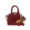 Moderna Colgante Brillante de Cereza Bolso de Mujer 2026 Nuevo de Moda Personalizado Mini Elegante de Labial Hombro Cruzado Bolso tipo Carcasa