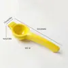 Stock transfronterizo aleación de aluminio exprimidor de limón manual exprimidor de jugo diseño de arco engrosado clip para fruta limón de bar