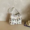 2026 Nuevo Bolso Personalizado con Estampado Floral Texturizado de Moda Gran Capacidad de Hombro Único para Mujer Bolso Tote Cruzado de Diseño de Nicho