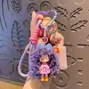 Chaveiro de menina de desenho animado moderno e descolada com cabelo cacheado, pingente de silicone, boneca Nai Fu, acessório para bolsa feminina, pequeno presente chaveiro