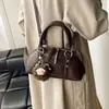Moda Otoño 2026 Bolso Cruzado de Nicho para el Trabajo Bolso de Bolos Nuevo Bolso de Hombro Versátil Bolso Bandolera Estilo Retro