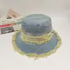 Moda Nuevo Sombrero de Pescador de Mezclilla Sombrilla para Exteriores Sombrero para el Sol Estilo Europeo y Americano Retro Borde Crudo Sombrero de Cubo Listo para la Venta