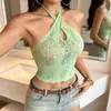 Lencería sexy de comercio exterior europeo y americano, conjunto de malla hueco ajustado, uniforme sexy transparente, cuello halter, camiseta sin mangas verde para mujer en stock