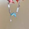Pulsera de Borla de Perla con Esmalte Goteado de Mariposa Azul para Mujer Nicho Elegante Lujo Ligero Alta Gama Dulce Combinable Cadena para Clavícula