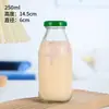 Botellas de vidrio transparentes y sencillas para bebidas, personalizables con logotipos, disponibles en versiones más gruesas para bebidas, vino, jugo de frutas, refrescos y cold brew