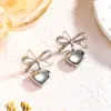 Brincos de Coração com Laço Estilo Hong Kong, Estilo Retro Francês, Aço Titânio, Ouro 18K, Sensação de Luxo, Brincos Doces para Melhores Amigas