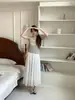 Saia Midi Plissada Estilo Indústria Pesada Feminina Verão 2026 Novo Estilo Coreano Estilo Férias Saia Midi com Caimento