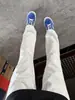 Pantalones de chándal grises con estampado de flores blancas, pierna ligeramente acampanada, pierna recta, para hombre, otoño, caída suelta, transpirables, pantalones deportivos, casual americano
