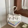 Bolso de hombro retro de alta gama para chica popular transfronterizo, bolso de hombro de moda estilo motociclista, bolso cruzado versátil para el día a día