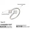 Anillo de dedo índice de flor de cuatro pétalos de insecto Mili de nicho con índice de circonita incrustada, color acero inoxidable, anillo de joyería de moda personalizado para mujer